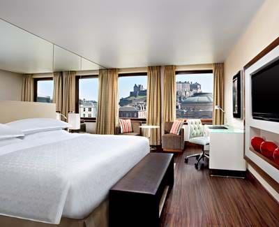 Bedroom at the Sheraton Grand Hotel & Spa with a view of Edinburgh Castle