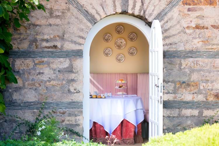 Afternoon tea viewed through magnificent open door