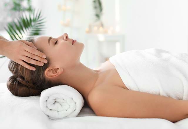 Woman having a head massage in a spa