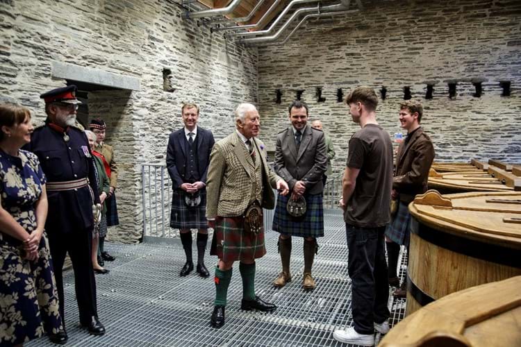 King Charles talks to staff